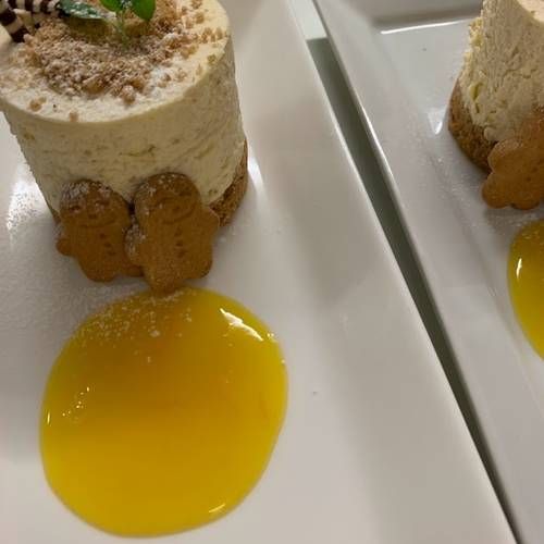 Christmas Menu: Gingerbread & Orange cheesecake with caramelised orange sauce